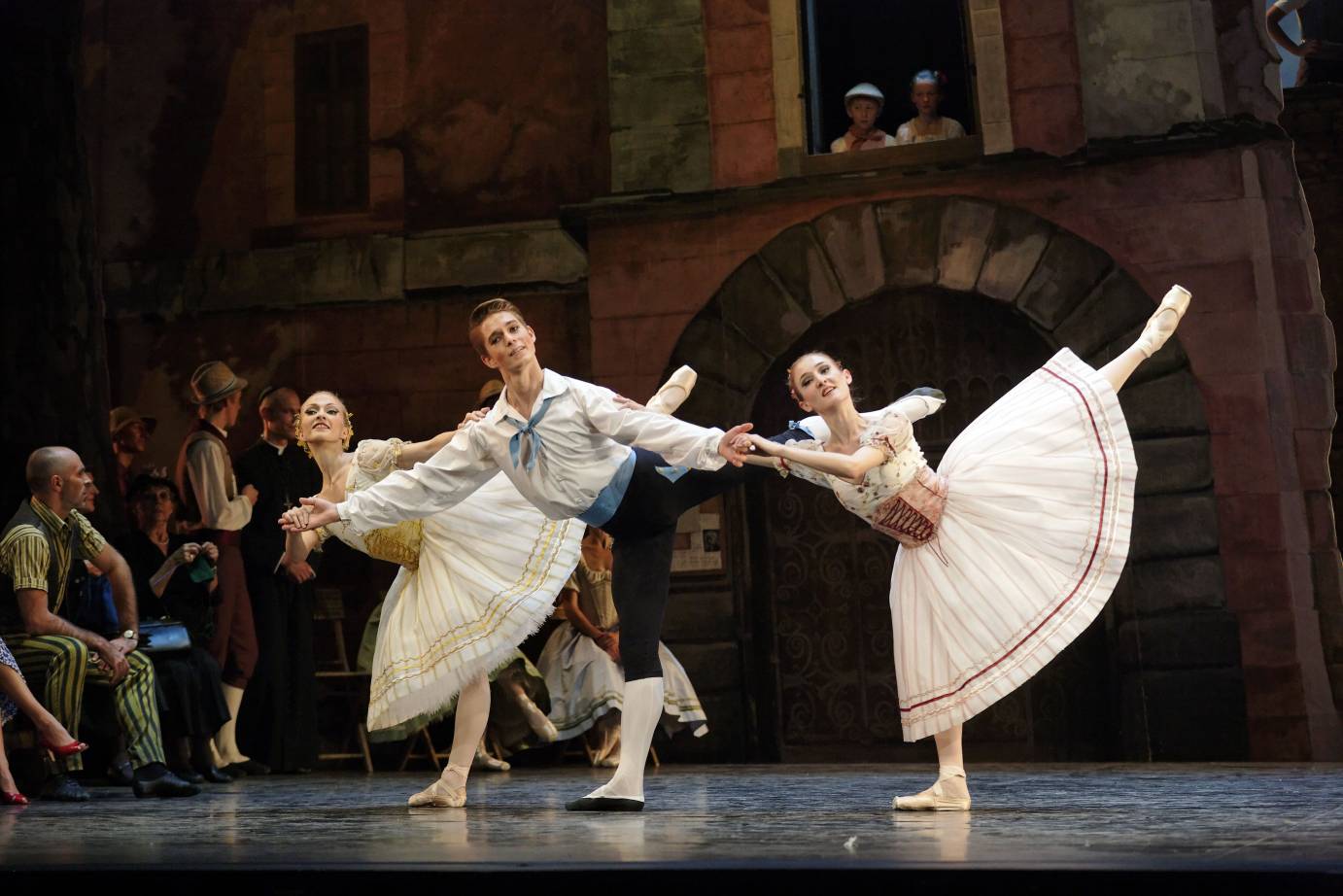 One man and two women in Romantic arabesque